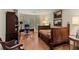 Inviting bedroom with hardwood floors, large windows, and elegant wooden furnishings at 1061 Arbor Ne Trce, Atlanta, GA 30319