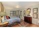 Cozy bedroom with natural light, classic furnishings and hardwood floors at 1061 Arbor Ne Trce, Atlanta, GA 30319