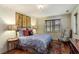Serene bedroom with natural light, classic furnishings, and decorative accents at 1061 Arbor Ne Trce, Atlanta, GA 30319