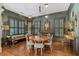 Sophisticated dining room with hardwood floors, designer lighting, and ample natural light at 1061 Arbor Ne Trce, Atlanta, GA 30319