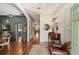 Elegant foyer featuring hardwood floors, a chandelier, and intricate trim work at 1061 Arbor Ne Trce, Atlanta, GA 30319