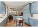 Expansive kitchen featuring gray cabinets, a center island, and stainless steel appliances at 1061 Arbor Ne Trce, Atlanta, GA 30319