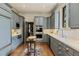 Charming kitchen with gray cabinets, stainless steel appliances, and hardwood floors at 1061 Arbor Ne Trce, Atlanta, GA 30319