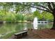 Picturesque lake view with a fountain, trees, and a bridge at 1061 Arbor Ne Trce, Atlanta, GA 30319