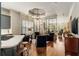 Open-concept living room with a modern divider, hardwood flooring, and lots of natural light at 1061 Arbor Ne Trce, Atlanta, GA 30319