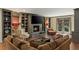 Comfortable living room with fireplace, built-in shelves, and plush seating at 1061 Arbor Ne Trce, Atlanta, GA 30319