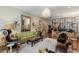 Spacious living room with a chandelier, mirror, and detailed interior design at 1061 Arbor Ne Trce, Atlanta, GA 30319