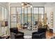 Elegant living room with floor to ceiling windows at 1061 Arbor Ne Trce, Atlanta, GA 30319