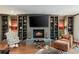 Cozy living room with fireplace, built-in shelving, and stylish decor at 1061 Arbor Ne Trce, Atlanta, GA 30319