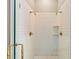 Shower room with white tiled walls, mosaic tiled floor, and dual shower heads at 1061 Arbor Ne Trce, Atlanta, GA 30319