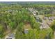 Stunning aerial view showcasing a home with lush greenery in a serene neighborhood at 2972 Nw Stilesboro Nw Rd, Kennesaw, GA 30152