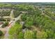 Picturesque aerial shot of a home surrounded by dense trees in a peaceful residential area at 2972 Nw Stilesboro Nw Rd, Kennesaw, GA 30152