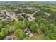 Beautiful aerial view of a traditional home nestled among lush greenery in a suburban neighborhood at 2972 Nw Stilesboro Nw Rd, Kennesaw, GA 30152