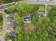 Aerial view of property and neighborhood showcasing the home's spacious lot and surroundings at 2972 Nw Stilesboro Nw Rd, Kennesaw, GA 30152
