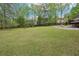Wide shot of the property's spacious and green backyard at 2972 Nw Stilesboro Nw Rd, Kennesaw, GA 30152