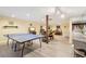Large finished basement featuring a ping pong table and a dining room at 2972 Nw Stilesboro Nw Rd, Kennesaw, GA 30152