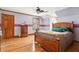 Bedroom featuring hardwood floors, neutral walls, and ample natural light at 2972 Nw Stilesboro Nw Rd, Kennesaw, GA 30152
