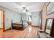 Cozy bedroom features wood floors and a window seat at 2972 Nw Stilesboro Nw Rd, Kennesaw, GA 30152