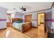 Bedroom featuring wood floors and traditional design at 2972 Nw Stilesboro Nw Rd, Kennesaw, GA 30152
