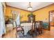 Charming dining room with hardwood floors, decorative walls, and a large window for natural light at 2972 Nw Stilesboro Nw Rd, Kennesaw, GA 30152