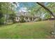 Beautiful home featuring a quaint front porch nestled among mature trees at 2972 Nw Stilesboro Nw Rd, Kennesaw, GA 30152