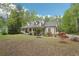 Charming home with front porch and lush landscaping at 2972 Nw Stilesboro Nw Rd, Kennesaw, GA 30152