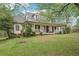 A delightful house with a covered front porch and attractive dark shuttered windows at 2972 Nw Stilesboro Nw Rd, Kennesaw, GA 30152