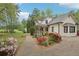Beautiful residence featuring blossoming landscaping and a private yard at 2972 Nw Stilesboro Nw Rd, Kennesaw, GA 30152