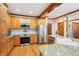 Well-equipped kitchen with stainless steel appliances, granite countertops, and hardwood floors at 2972 Nw Stilesboro Nw Rd, Kennesaw, GA 30152