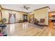 Bright living room with hardwood flooring, large windows, and elegant furniture arrangement at 2972 Nw Stilesboro Nw Rd, Kennesaw, GA 30152