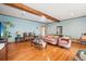 Spacious living room with hardwood floors, neutral walls, and an open layout at 2972 Nw Stilesboro Nw Rd, Kennesaw, GA 30152