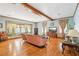 Cozy living room featuring hardwood floors, large windows, and comfortable seating at 2972 Nw Stilesboro Nw Rd, Kennesaw, GA 30152