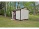 Outdoor shed with double doors for extra storage space at 2972 Nw Stilesboro Nw Rd, Kennesaw, GA 30152