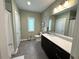 Bathroom featuring neutral walls, tile flooring, and a modern vanity with granite countertop at 35 Moda Ln, Atlanta, GA 30316