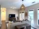 Comfortable living room with hardwood floors, neutral decor, and access to a balcony at 35 Moda Ln, Atlanta, GA 30316