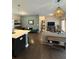 Open concept living area with a modern kitchen, warm colors, and cozy seating at 35 Moda Ln, Atlanta, GA 30316