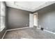 This bedroom features gray walls, white trim, and a unique tray ceiling with a string of lights at 4180 West Stubbs Rd, College Park, GA 30349
