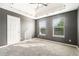 Bright bedroom with natural light and neutral walls, ready for personalization at 4180 West Stubbs Rd, College Park, GA 30349