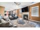 A comfortable living area shows an open floor plan with plush seating and fireplace at 4180 West Stubbs Rd, College Park, GA 30349