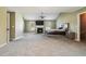 Spacious main bedroom with fireplace, a large bed, and plenty of natural light at 4180 West Stubbs Rd, College Park, GA 30349