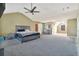 Cozy main bedroom boasts ample space, natural lighting, and neutral toned walls at 4180 West Stubbs Rd, College Park, GA 30349
