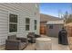 Outdoor patio area with comfortable seating, fire pit, grill and convenient storage shed at 9032 Jim Purcell Dr, Covington, GA 30014