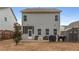 Wide shot of backyard featuring a patio, outdoor seating, a shed, and cooking equipment at 9032 Jim Purcell Dr, Covington, GA 30014