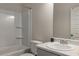 Functional bathroom with a tub, toilet, and single sink vanity, providing essential amenities at 9032 Jim Purcell Dr, Covington, GA 30014