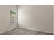 Bedroom with a window bringing in natural light at 9032 Jim Purcell Dr, Covington, GA 30014