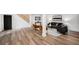 Finished basement space featuring a sitting area, recessed lights and new floors at 2685 Glenvalley Dr, Decatur, GA 30032