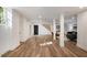 Open basement space featuring new floors, recessed lighting, and a stairway to the first floor at 2685 Glenvalley Dr, Decatur, GA 30032