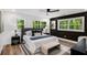 Main bedroom with large windows, modern furnishings and sleek decor at 2685 Glenvalley Dr, Decatur, GA 30032