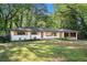 Charming renovated single-story home with modern updates, landscaping, and a welcoming front yard at 2685 Glenvalley Dr, Decatur, GA 30032