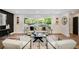 Spacious living room with modern decor, hardwood floors, and an abundance of natural light at 2685 Glenvalley Dr, Decatur, GA 30032